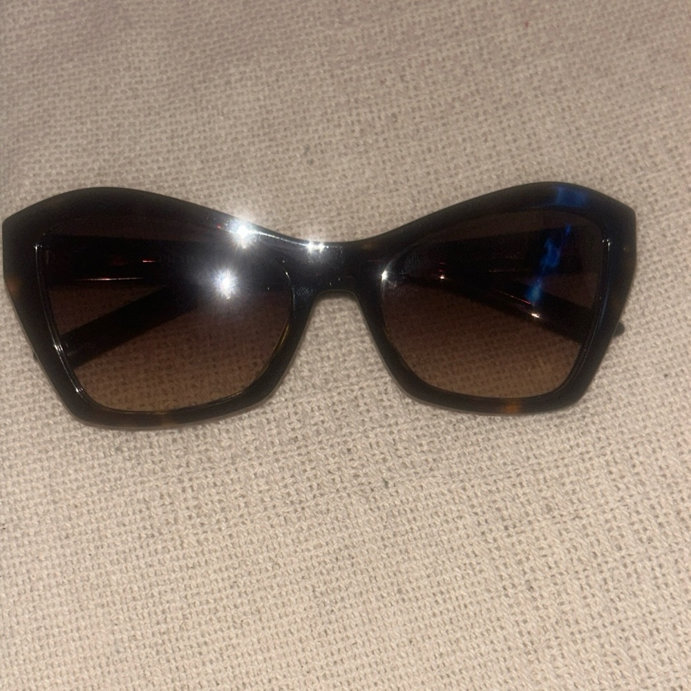 Woman Prada shades